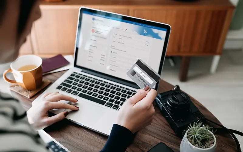 woman holding credit card