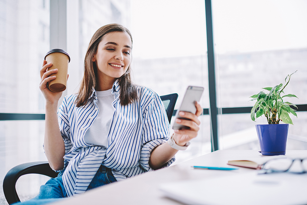 girl on sofa with phone